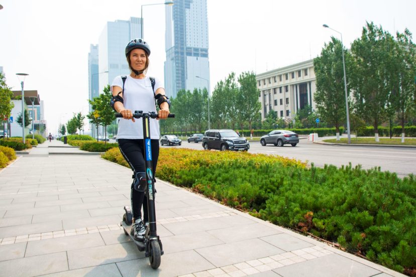 woman riding an electric scooter