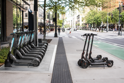 Docked vs. Dockless E-Scooters